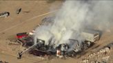 Smoke billows from junkyard fire along I-25 in Dacono