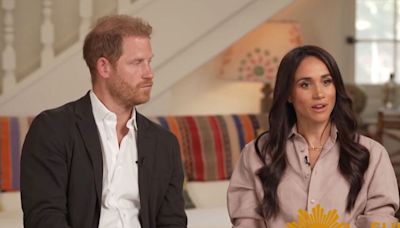 Meghan Markle's mask slips as she gives Harry 'signal' to show she's in control