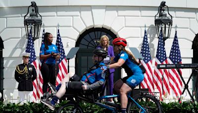 Jill Biden praises her husband's advocacy for the military as wounded vets begin annual bike ride