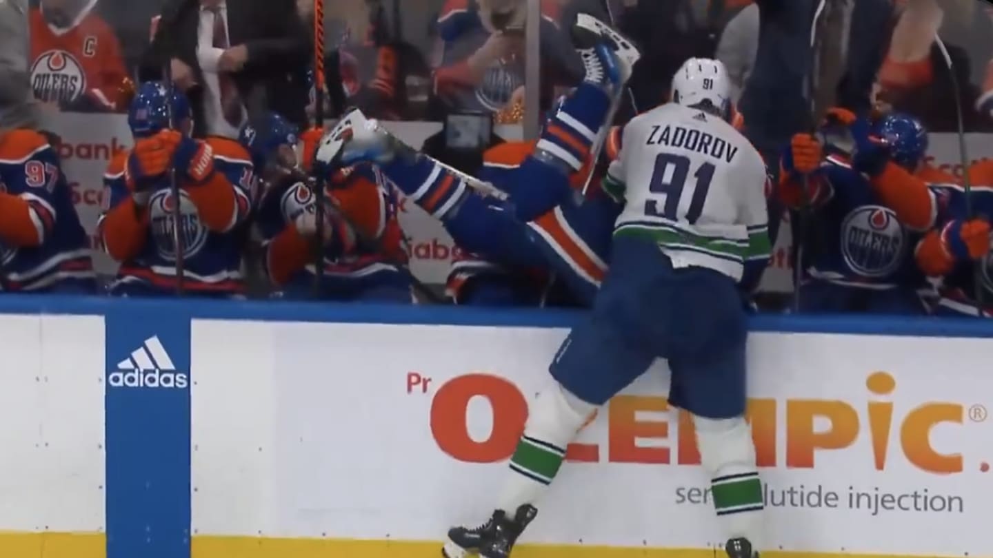 Canucks' Nikita Zadorov Sits Down Evander Kane With Brutal Hit Into Oilers Bench