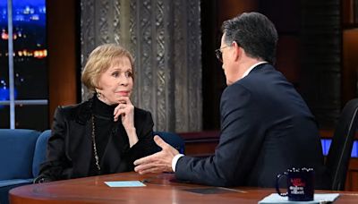 Carol Burnett reminisces on meeting Elvis Presley, being the 'worst' talk show guest for Johnny Carson and her new Apple series Palm Royale on Late Show with Stephen Colbert