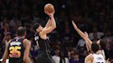 Devin Booker cashes in on halftime buzzer beater