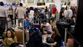 Airports across US descend into chaos: Passengers 'just trying to hunker down'