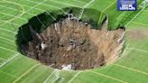 Football pitch swallowed up by 100ft-wide sinkhole