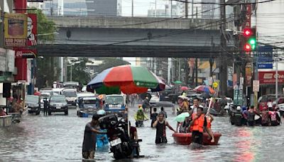 Taiwan shutters offices ahead of typhoon that worsened rains in the Philippines, killing 8