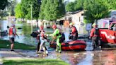 Midwestern flooding collapses a bridge, forces evacuations and kills at least 1