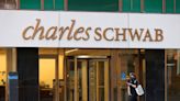 Schwab's profit drops less than expected on asset management strength