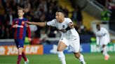 Champions League: Paris Saint-Germain stuns short-handed Barcelona; Dortmund rallies past Madrid