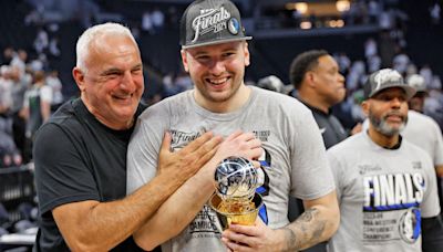 LOOK: Luka Doncic's beer gets stolen right out of his hand by Mavericks exec Michael Finley during celebration