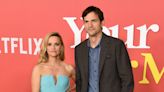 Ashton Kutcher says he stood awkwardly around Reese Witherspoon on the 'Your Place or Mine' red carpet to prevent affair rumors