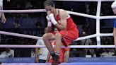 Under pressure: Algerian boxer Imane Khelif triumphs after days of abuse over 'gender controversy'