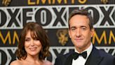 Keeley Hawes and Matthew Macfadyen pose arm-in-arm on the red carpet