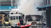 Boat fire spreads to building in Westlake