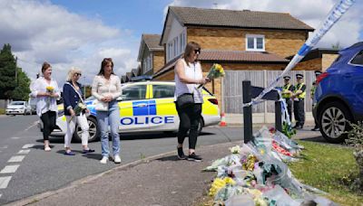 UK inquest hears how 1 of 3 women killed at home in crossbow attack managed to text for help