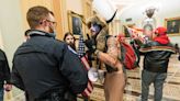 Capitol Rioter Known as 'QAnon Shaman' Files to Run for Congress