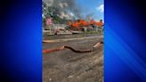 Firefighters battle fire at Hyde Park salvage yard