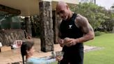 Dwayne Johnson Demonstrates How to Crack Open a Coconut with Just a Rock on Easter