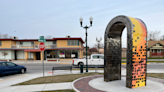 Photo album-inspired arch in Garden City reflects an artist’s gratitude and community’s history
