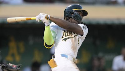 Lawrence Butler hits one of the A's five homers in an 8-2 win over the Astros