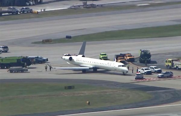 Plane Collision Nearly Severs Tail of Aircraft From Body at Atlanta Airport: Video