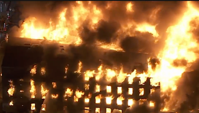 Firefighters battling 4-alarm warehouse fire in Philadelphia's Frankford neighborhood