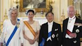 Queen wears the King Charles III Family Order for first time at state banquet