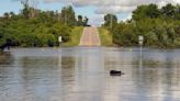 Millions swelter as temperatures soar across the US, while floodwaters inundate the Midwest