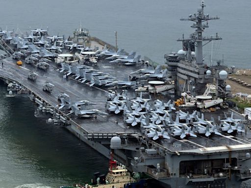 A US Navy aircraft carrier has arrived in South Korea just days after Russia and North Korea signed a defense pact