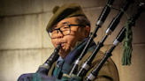 Bagpiper Daniel Kim plays in remembrance of fallen soldiers of Korean War