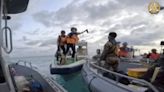 The Philippines says its forces sailed to hotly disputed shoal guarded by China without any clashes