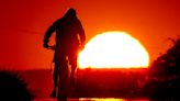 AP PHOTOS: Record-breaking heat scorches communities around the world