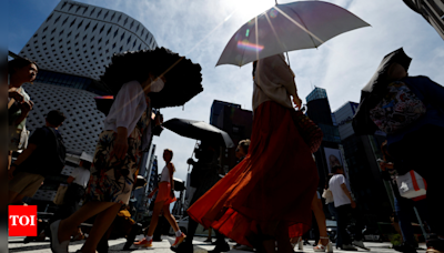 Japan issues heatstroke warning as 'cooling shelters' offer respite - Times of India