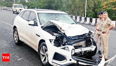 Tragedy averted as structure falls on moving car | Mumbai News - Times of India