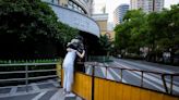 Shanghai hits prized 'zero COVID' status but lockdown lingers