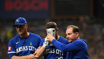 Kansas City Royals’ Kyle Isbel leaves game after taking a foul ball to the face