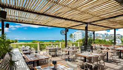 This New Celeb-loved Restaurant Overlooks the 'World's Best Beach' — and It Has Local Delicacies, Outdoor Dining, and Stunning Sunset Views