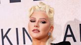 Christina Aguilera Shuts Down The Red Carpet In A Low-Cut, Curve-Hugging Violet Gown At The Latin Grammys