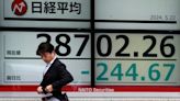 Stock market today: Asian shares mostly higher after Wall Street sets more records