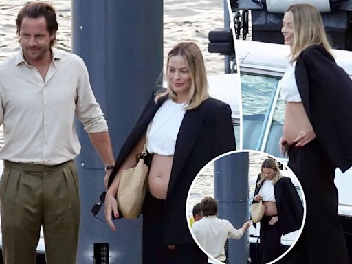 Pregnant Margot Robbie debuts baby bump in crop top on vacation with husband Tom Ackerley