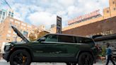 Electric truck maker Rivian says construction on 1st phase of Georgia factory will proceed in 2024