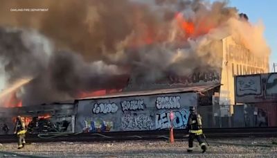 Crews battling 4-alarm fire at Oakland lumber yard