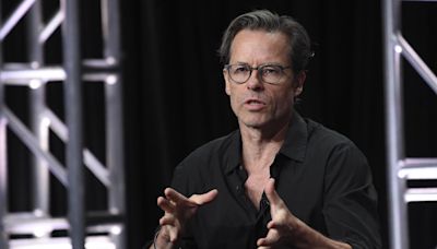 Vanity Fair France apologizes for editing Palestinian flag pin out of Guy Pearce photo