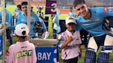 Gujarat Titans' Shubman Gill opens a barrier door as a little fan asks for a picture, see pic