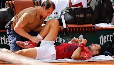 Novak Djokovic forced to withdraw from French Open with knee injury