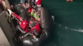 Video shows capsized boat carrying almost 50 people through the English Channel