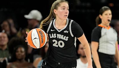 Kate Martin, A.J. Epenesa share an Edwardsville moment during WNBA game