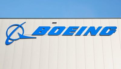 Boeing posts lower first quarter loss, beating estimates