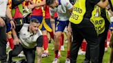 Spain’s Morata takes painful knock on leg in accidental clash with security guard after France match