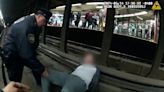 Watch NYPD officers' lifesaving rescue of a man who fell on the subway tracks