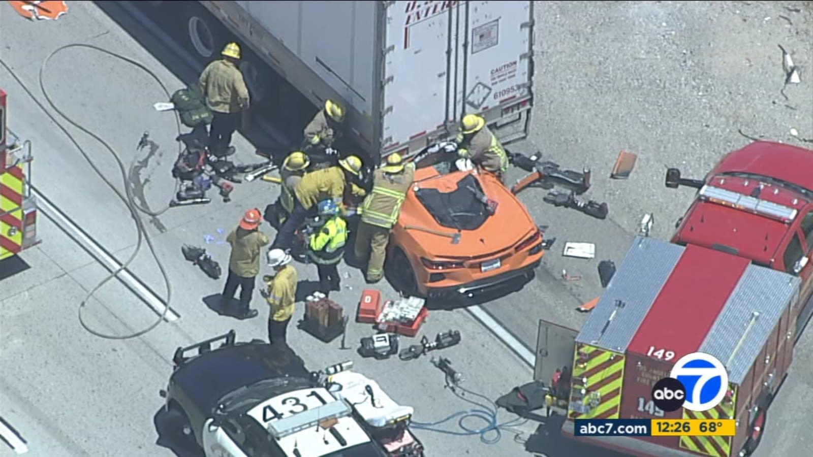 Man injured after Corvette becomes pinned under big rig on 5 Freeway in Castaic